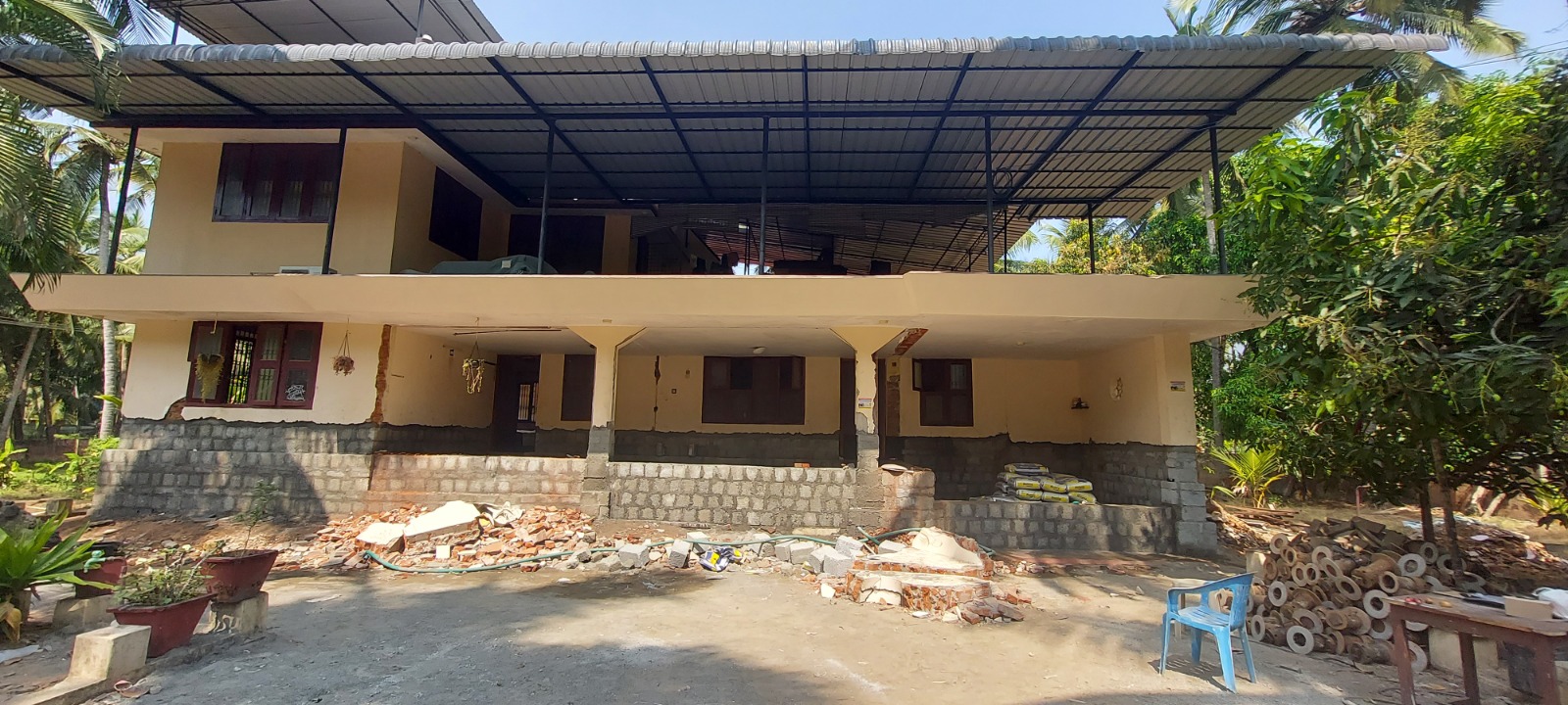Two-storey house lifted on blocks